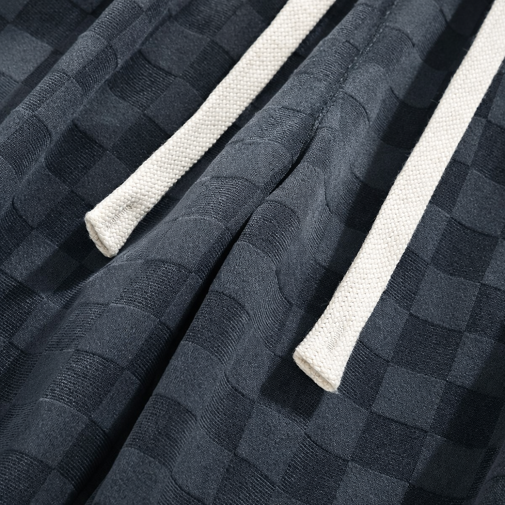 Męskie spodnie bawełniane w kratę o luźnym kroju